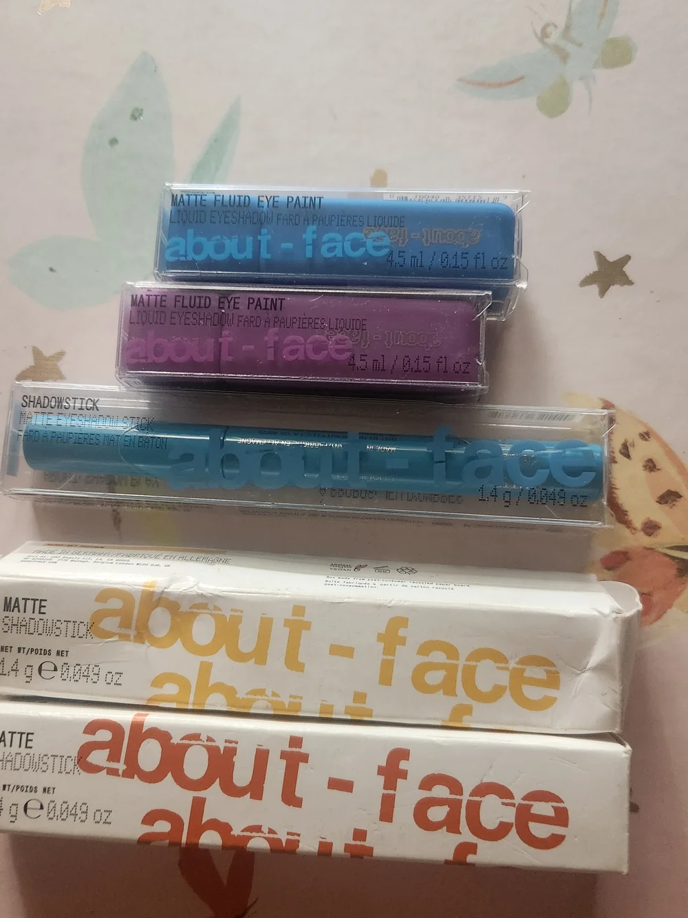 about-face eye shadowsticks (3) and eye paints ( 3) 3 Blue, Purple,orange Yellow